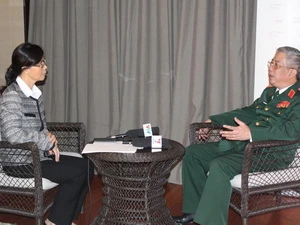 Thượng tướng Nguyễn Chí Vịnh trả lời phỏng vấn. (Ảnh: Kim Yến/Vietnam+)