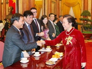 Phó Chủ tịch nước Nguyễn Thị Doan gặp mặt thân mật các Nhà tài trợ cho Quỹ Bảo trợ trẻ em Việt Nam. (Ảnh: Dương Giang/TTXVN)