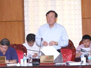 Viện trưởng Viện kiểm sát nhân dân tối cao Nguyễn Hòa Bình trình bày Báo cáo công tác năm 2013. (Ảnh: Phương Hoa/TTXVN)