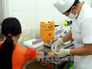 Điều trị dự phòng cho trường hợp nhiễm HIV. (Ảnh: Dương Ngọc/TTXVN)