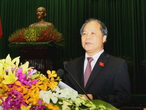 Ông Phan Trung Lý trình bày các báo cáo về Dự thảo sửa đổi Hiến pháp 1992. (Nguồn: TTXVN)