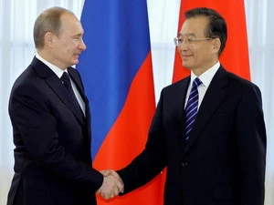 Trung Quốc, Nga mở rộng hợp tác trên các lĩnh vực then chốt. (Nguồn: AFP)