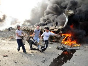 Hiện trường một vụ đánh bom kép tại Damascus. (Nguồn: AFP/TTXVN)