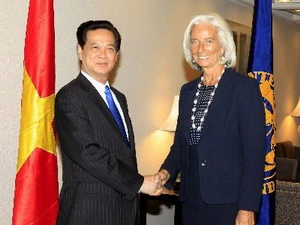 Thủ tướng Nguyễn Tấn Dũng gặp Tổng Giám đốc Điều hành IMF Christine Lagarde. (Ảnh: Đức Tám/TTXVN)