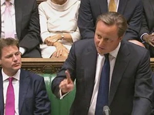 Thủ tướng Anh David Cameron (phải). (Nguồn: AFP/TTXVN)