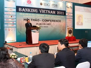 Thống đốc Ngân hàng Nhà nước Nguyễn Văn Giàu phát biểu tại hội thảo. (Ảnh: Trần Việt (TTXVN/Vietnam+)