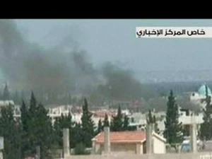 Cảnh đổ nát tại Qusayr sau xung đột ngày 20/5. (Hình ảnh do Đài truyền hình nhà nước Syria cung cấp. Nguồn :AFP/TTXVN)