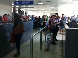 Du khách Nga nhập cảnh tại sân bay Cam Ranh, Khánh Hòa. (Ảnh: Ánh Dương/Vietnam+)