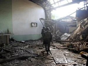 Hiện trường vụ đánh bom bên ngoài một nhà thờ trên đảo Jolo ở miền Nam Philippines. (Nguồn: AP)