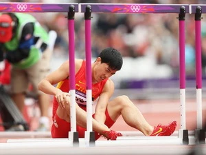 Liu Xiang chia tay sớm Olympic London. (Nguồn: Getty)