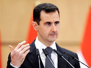 Ông Bashar al-Assad có cuộc hội đàm với Chủ tịch Quốc hội Iran Ali Larijani. (Nguồn: AP)