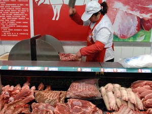 Một quầy bán thịt lợn ở thành phố Tế Nam, tỉnh Sơn Đông. (Nguồn: THX/TTXVN)