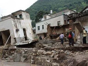 Các lớp học và hai ngôi nhà bị chôn vùi trong vụ lở núi. (Nguồn: Reuters) 