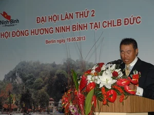 Ông Nguyễn Bình Định, Chủ tịch hội đọc báo cáo tổng kết. (Ảnh: Thanh Hải/Vietnam+) 