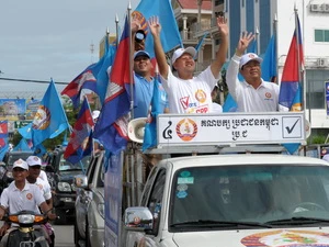 Ứng cử viên Đảng CPP trong cuộc vận động tranh cử ở thủ đô Phnom Penh. (Nguồn: AFP/TTXVN)
