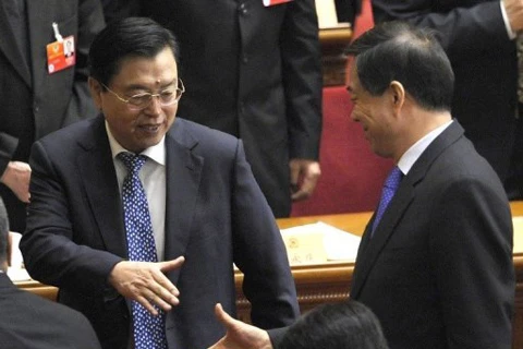 Ông Trương Đức Giang (trái) và ông Bạc Hy Lai trong một cuộc họp khi ông Bạc còn đương chức (Nguồn: AFP)