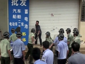 Cảnh sát Trung Quốc bắt giữ người đàn ông đâm chết cán bộ dân số ở Quảng Tây (Nguồn: AP)