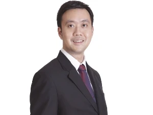 Ông Raymond Lui, Giám đốc Trung tâm Cục Phát triển Doanh nghiệp quốc tế Singapore tại Hà Nội. (Ảnh: Thu Huyền/Vietnam+).