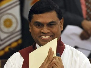 Em trai của Tổng thống Rajapakse là Basil Rajapakse tuyên thệ chức Bộ trưởng Kinh tế. (Ảnh: Getty Images)
