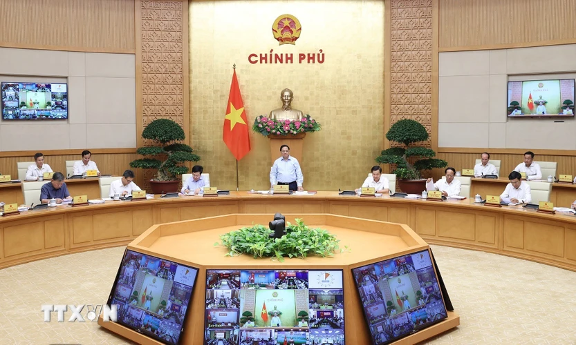 Sáng 4/7, tại Hà Nội, Thủ tướng Phạm Minh Chính chủ trì Hội nghị trực tuyến Chính phủ với các địa phương và phiên họp Chính phủ thường kỳ tháng 6 năm 2022. (Ảnh: Dương Giang/TTXVN)