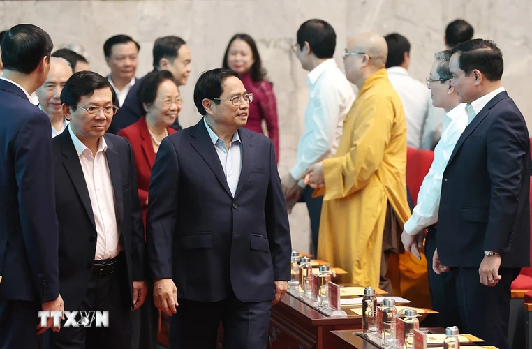 Thủ tướng Phạm Minh Chính đến dự chương trình 'Cả nước chung tay vì người nghèo' năm 2022. (Ảnh: Dương Giang/TTXVN)