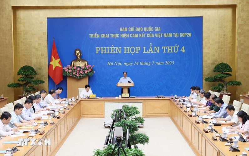 Thủ tướng Phạm Minh Chính, Trưởng Ban Chỉ đạo chủ trì phiên họp lần thứ 4 của Ban Chỉ đạo Quốc gia triển khai thực hiện cam kết của Việt Nam tại Hội nghị lần thứ 26 Các bên tham gia Công ước khung của Liên hợp quốc về Biến đổi Khí hậu - COP26. (Ảnh: Dương Giang/TTXVN)