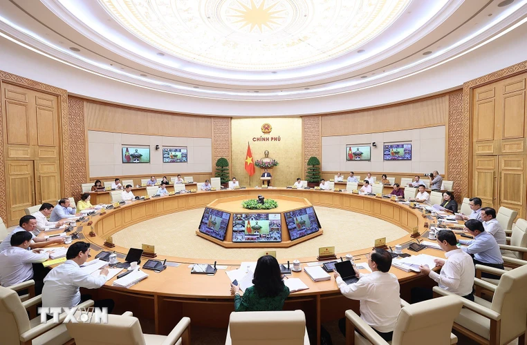Thủ tướng Phạm Minh Chính chủ trì Phiên họp Chính phủ thường kỳ tháng Chín trực tuyến đến điểm cầu 63 địa phương. (Ảnh: Dương Giang/TTXVN)