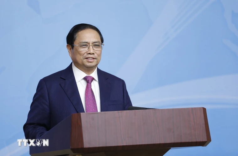 Thủ tướng Phạm Minh Chính chủ trì Hội nghị Tổng kết công tác ngoại giao vaccine. (Ảnh: Dương Giang/TTXVN)