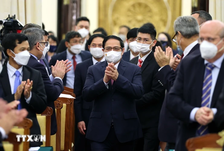 Thủ tướng Phạm Minh Chính đến dự buổi gặp các đối tác quốc tế đã hỗ trợ vaccine phòng COVID-19 cho Việt Nam. (Ảnh: Dương Giang/TTXVN)