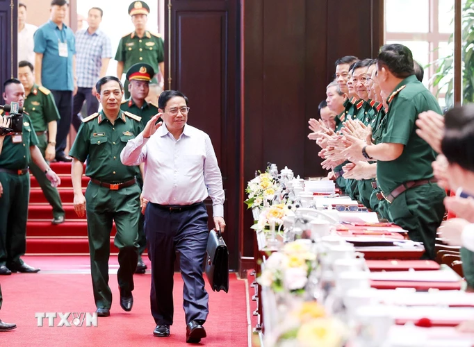 Thủ tướng Phạm Minh Chính tới dự hội nghị. (Ảnh: Dương Giang/TTXVN)