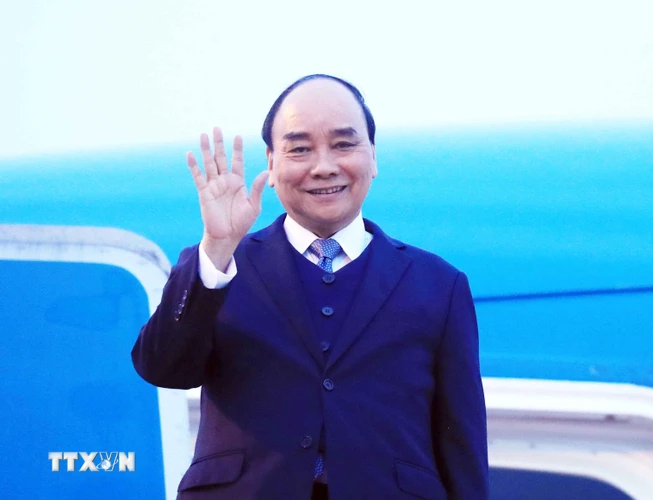 Chủ tịch nước Nguyễn Xuân Phúc đến sân bay quốc tế Soekarno-Hatta, Jakarta, Indonesia. (Ảnh: Thống Nhất/TTXVN)
