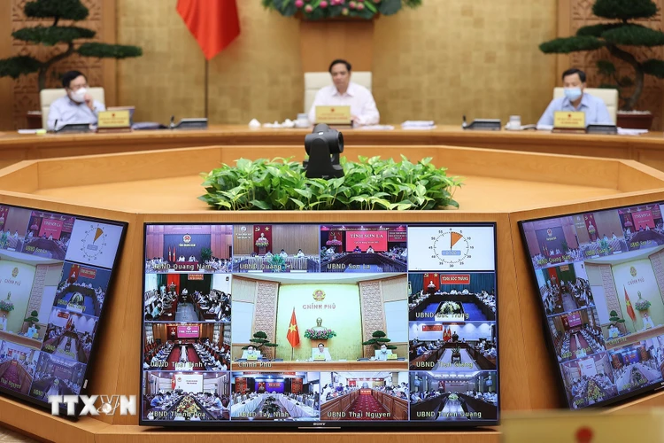 Các địa phương tham dự Phiên họp Chính phủ thường kỳ tháng 9 theo hình thức trực tuyến. (Ảnh: Dương Giang/TTXVN)