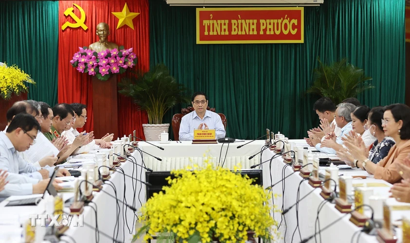 Thủ tướng Phạm Minh Chính chủ trì làm việc với lãnh đạo chủ chốt tỉnh Bình Phước. (Ảnh: Dương Giang/TTXVN)