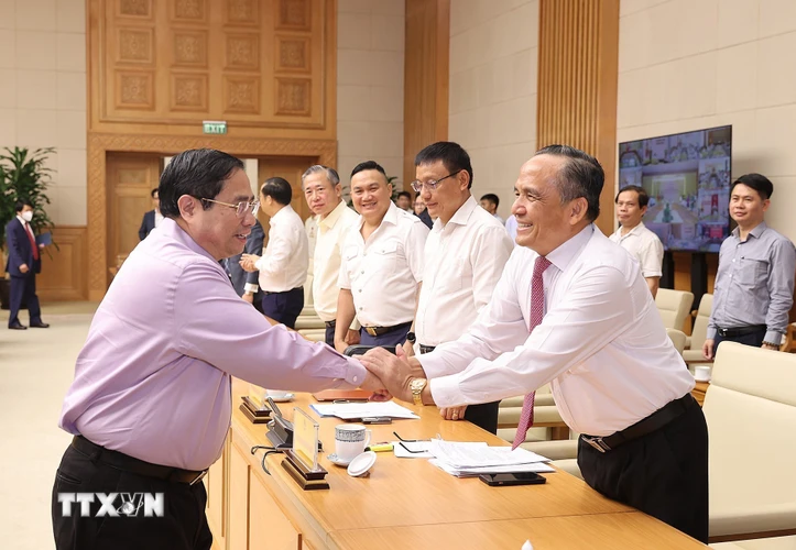 Thủ tướng Phạm Minh Chính với các đại biểu tham dự Hội nghị. (Ảnh: Dương Giang/TTXVN)