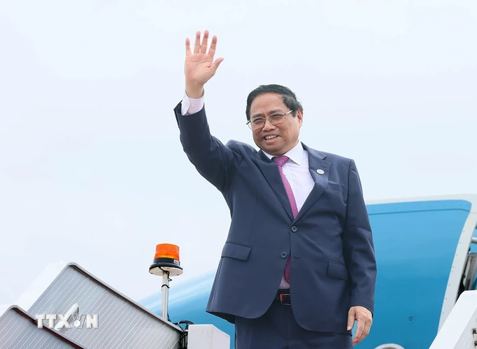 Thủ tướng Phạm Minh Chính kết thúc chuyến tham dự CAEXPO và CABIS lần thứ 20 tại Nam Ninh, Trung Quốc. (Ảnh: Dương Giang/TTXVN)