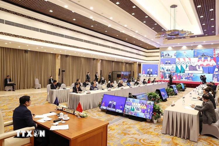 Quang cảnh Hội nghị cấp cao ASEAN-Ấn Độ lần thứ 18 theo hình thức trực tuyến tại điểm cầu Hà Nội. (Ảnh: Dương Giang/TTXVN)