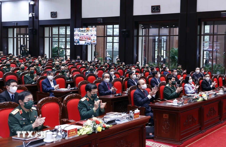 Chủ tịch nước Nguyễn Xuân Phúc dự Hội nghị Quân chính toàn quân năm 2021. (Ảnh: Thống Nhất/TTXVN)