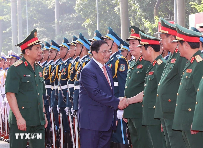 Sáng 18/5/2023, tại Hà Nội, Thủ tướng Phạm Minh Chính tới dự Chương trình tổng kết, trao Giải thưởng Tuổi trẻ sáng tạo trong Quân đội lần thứ 23. (Ảnh: Trọng Đức/TTXVN)