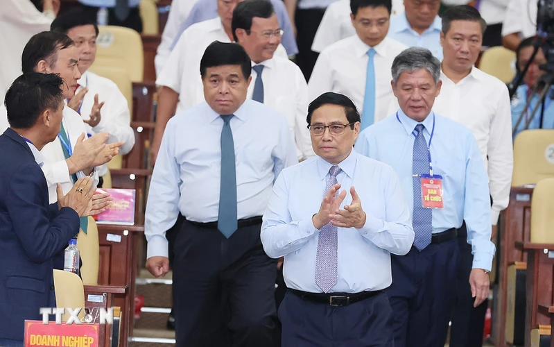 Thủ tướng Phạm Minh Chính đến dự Hội nghị Công bố Quy hoạch tỉnh Trà Vinh. (Ảnh: Dương Giang/TTXVN)