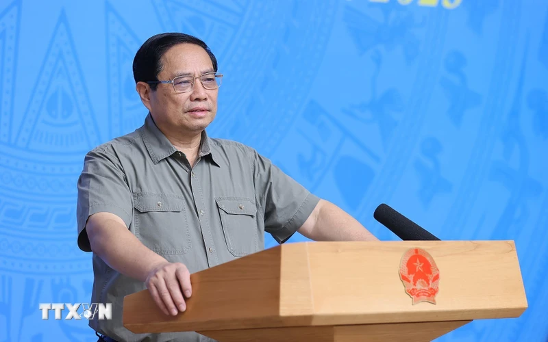Thủ tướng Phạm Minh Chính chủ trì Hội nghị tổng kết công tác phòng, chống dịch COVID-19. (Ảnh: Dương Giang/TTXVN)