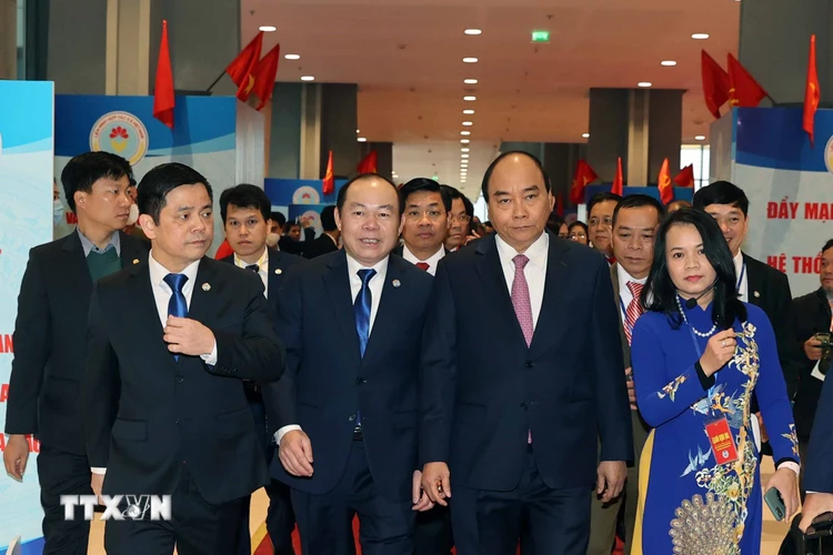 Thủ tướng Nguyễn Xuân Phúc đến dự Đại hội. (Ảnh: Thống Nhất/TTXVN)