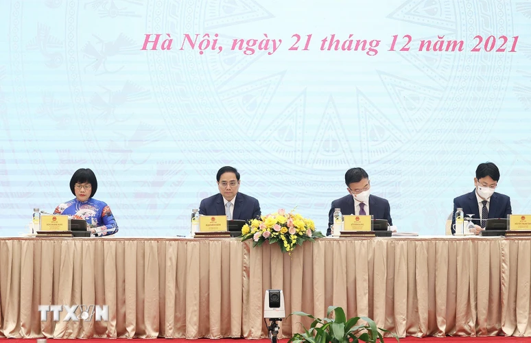 Thủ tướng Phạm Minh Chính và Bộ trưởng Bộ Tư pháp Lê Thành Long cùng các Thứ trưởng Bộ Tư pháp chủ trì hội nghị. (Ảnh: Dương Giang/TTXVN)