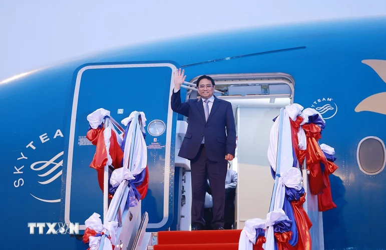 Lễ đón Thủ tướng Phạm Minh Chính dự Hội nghị cấp cao Ủy hội sông Mekong quốc tế lần thứ 4 tại Vientiane, Lào. (Ảnh: Dương Giang/TTXVN)