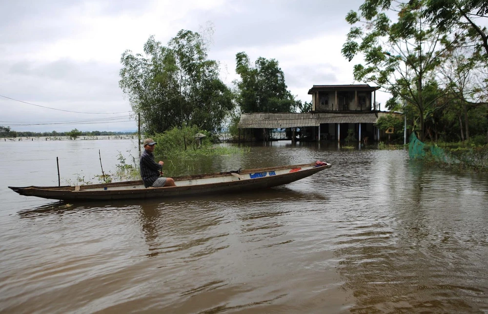 Hình ảnh ngập lụt tại huyện Quảng Điền (Thừa Thiên-Huế). (Ảnh: Hồ Cầu/TTXVN)