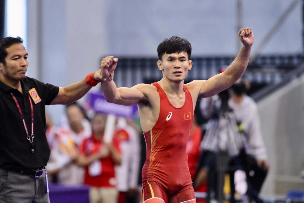Nguyễn Văn Công giành chiến thắng ở hạng cân 57kg. (Ảnh: Vietnam+)
