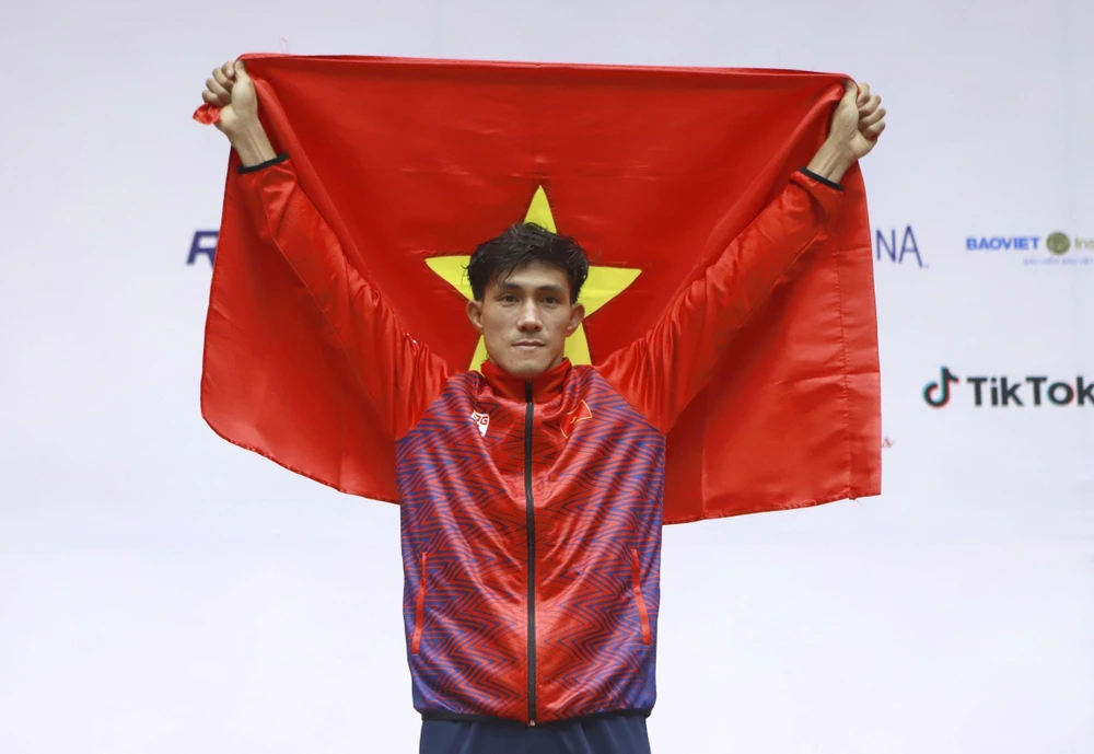 Nguyễn Trần Duy Nhất giành HCV SEA Games hạng cân 60kg. (Ảnh: Hoàng Hùng/TTXVN)