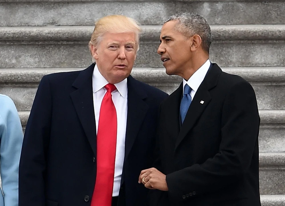 Tổng thống Mỹ Donald Trump và cựu Tổng thống Barack Obama. (Nguồn: AFP)