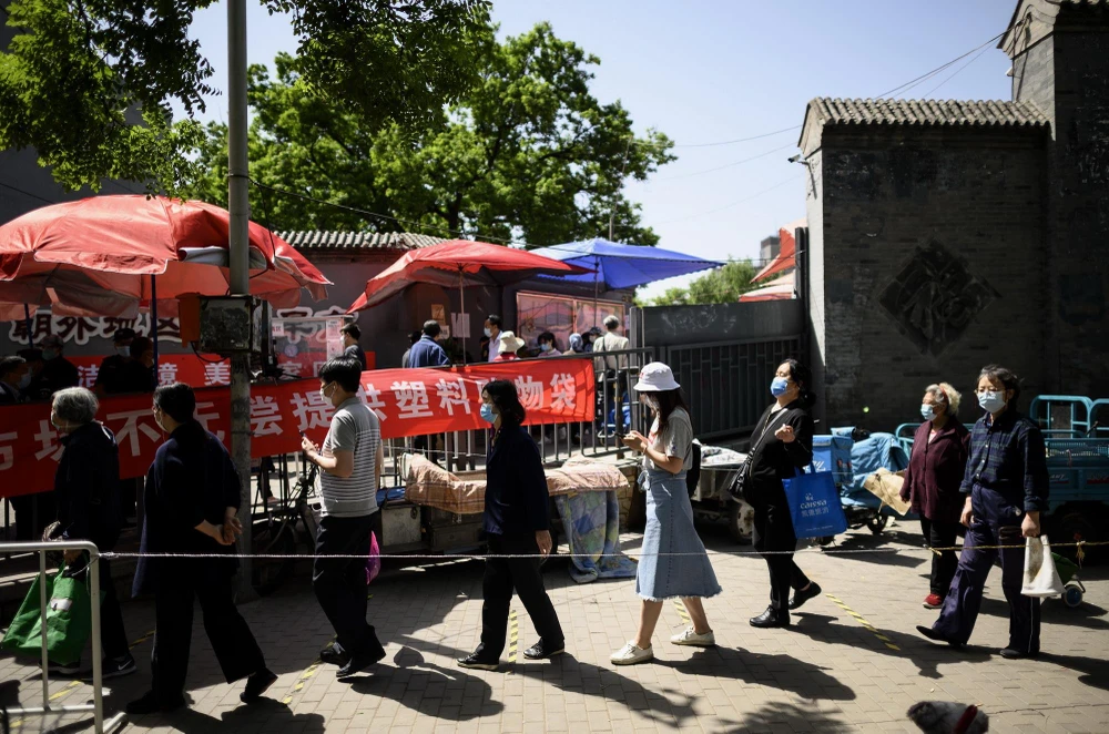 Trung Quốc thực hiện hạn chế đi lại tại các ổ dịch ở thành phố Cát Lâm. (Ảnh: AFP/TTXVN)