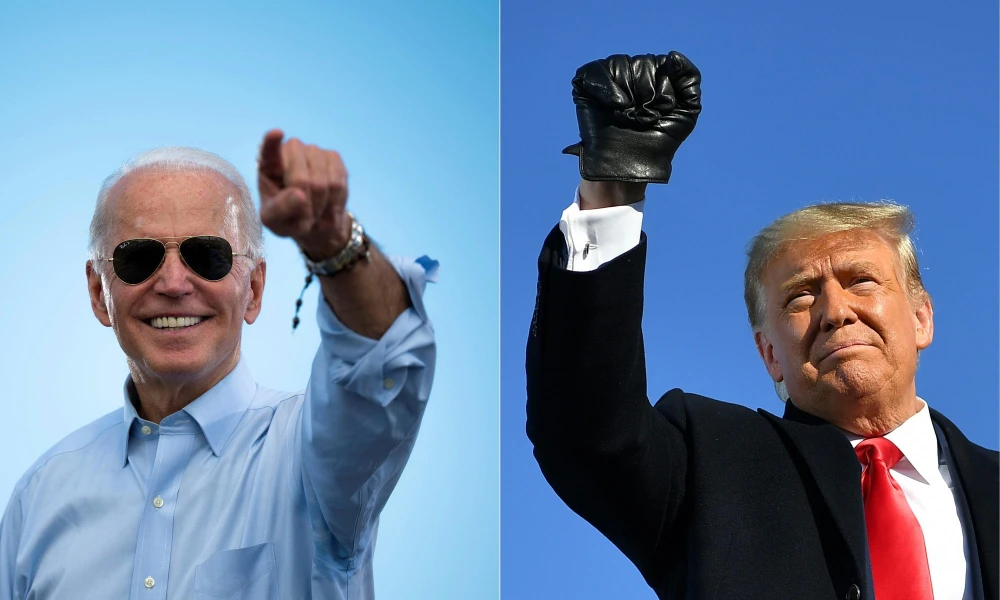 Cuộc đua vào Nhà Trắng giữa đương kim Tổng thống Donald Trump (phải) và ứng cử viên đảng Dân chủ Joe Biden được dự đoán sẽ rất căng thẳng. (Ảnh: AFP/TTXVN)