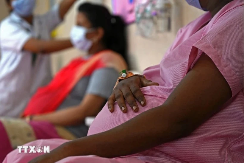 Luật Phòng, chống mua bán người hiện hành của Việt Nam chưa quy định thai nhi có quyền con người. (Ảnh minh họa: AFP/TTXVN)